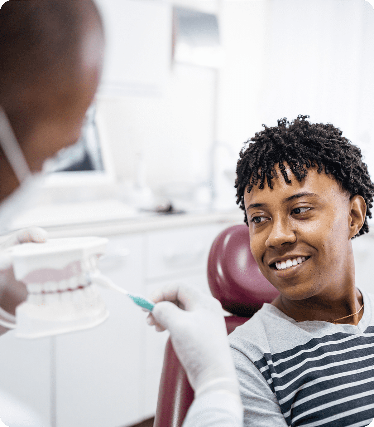 Patient learning dental hygiene techniques
