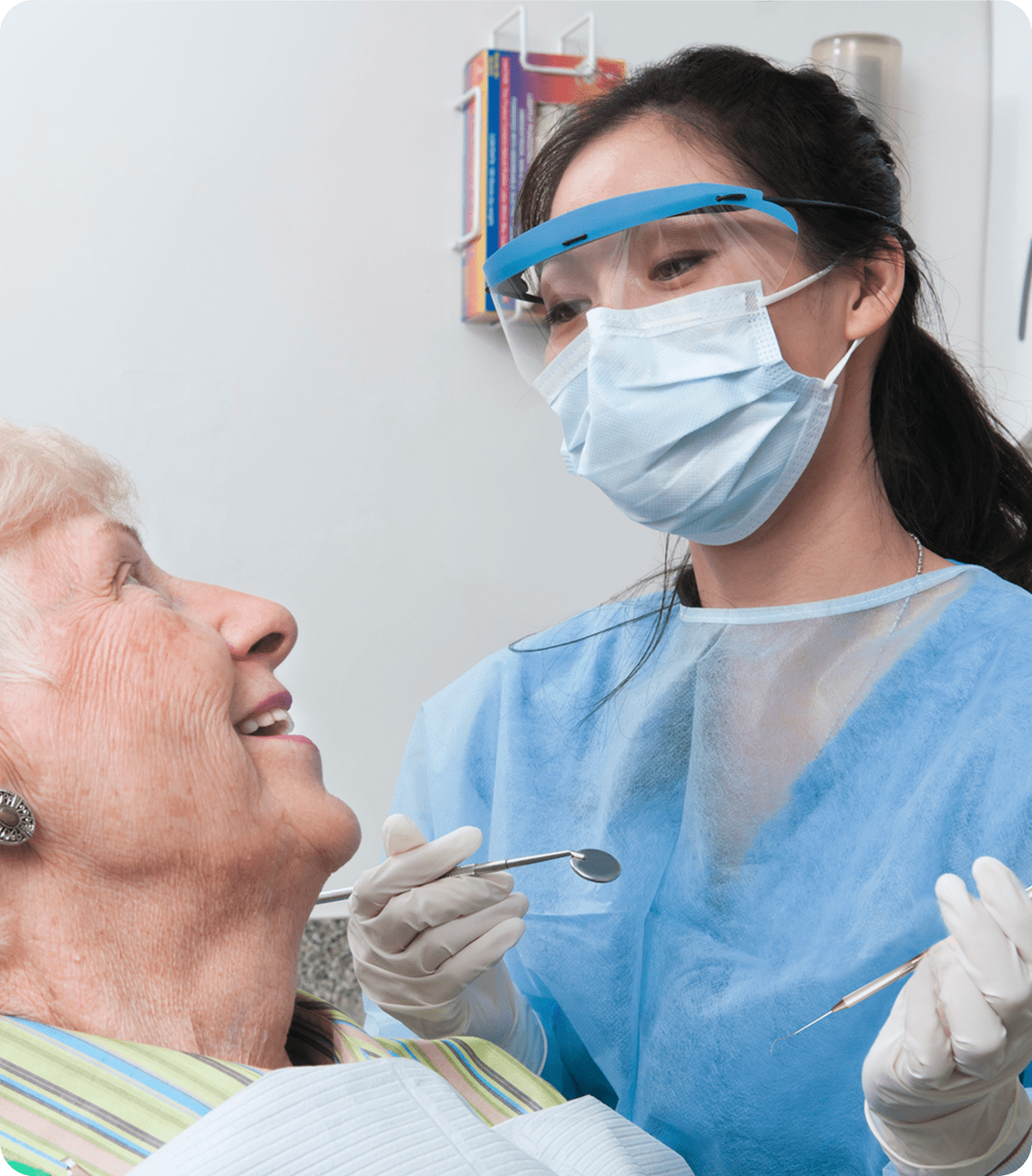Dental check-up with senior patient